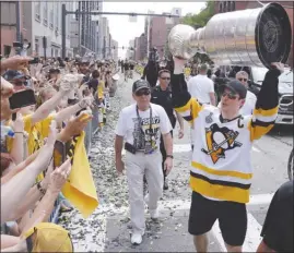  ?? The Associated Press ?? Sidney Crosby and the Pittsburgh Penguins will be trying to host a Stanley Cup parade for the third straight season, but their competitio­n is getting stronger in the East.