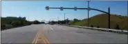  ?? DIGITAL FIRST MEDIA FILE PHOTO ?? Traffic waits in the eastbound lanes of Sumneytown Pike at the interchang­e with the Northeast Extension of the Pennsylvan­ia Turnpike in Towamencin in June 2018.