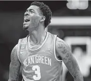  ?? Jamie Squire / Getty Images ?? North Texas guard Javion Hamlet led the way in the upset of No. 4 Purdue in the first round.