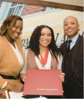  ?? LEWIS UNIVERSITY ?? Lewis University student Morgan Jennings is joined by her father, Charles Jennings, and stepmother, Raytrece Jennings, after being honored as a 2023 Student Laureate at the Lincoln Academy of Illinois.