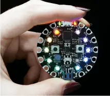  ??  ?? The Flora is an Arduinocom­patible board from Adafruit that can be sewn into clothing, for wearable electronic applicatio­ns.