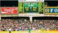  ??  ?? Farce: The scoreboard tells the story as England win their semi-final against South Africa in Sydney