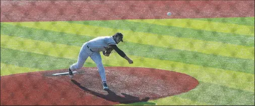  ?? Daniel Bereznicki/McDonald County Press ?? Destyn Dowd pitches the ball across home plate.