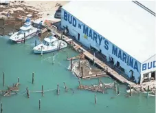  ?? JACK GRUBER, USA TODAY ?? Bud N’ Mary’s Marina in Islamorada, Fla., suffered extensive damage when Hurricane Irma roared ashore.