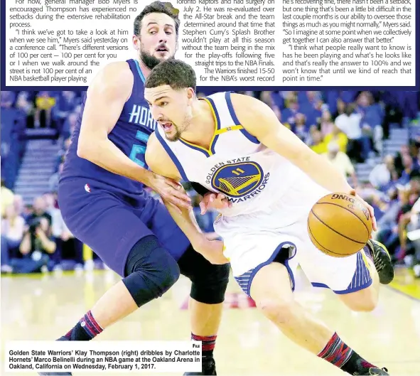  ?? FILE ?? Golden State Warriors’ Klay Thompson (right) dribbles by Charlotte Hornets’ Marco Belinelli during an NBA game at the Oakland Arena in Oakland, California on Wednesday, February 1, 2017.