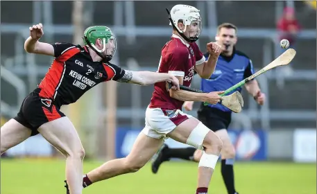  ??  ?? Rory O’Connor (St. Martin’s) breaks free of Anthony Roche (Oulart-The Ballagh) during the last Pettitt’s Senior hurling championsh­ip clash between the clubs - the coun ty final of 2017, won by the men in maroon on a 2-16 to 1-9 scoreline.