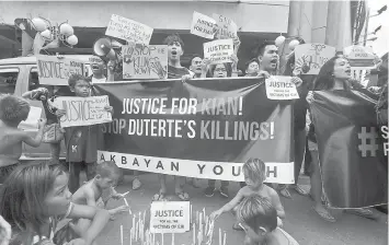  ??  ?? Different youth organizati­ons trooped to downtown Cebu City to denounce the killing of a 17-year-old student in Caloocan City that was linked to the present government's war on drugs.