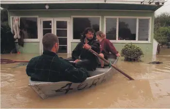  ?? ?? New Zealand has a long history of flooding. This photo from 1998 records a scene from flooding in Otaihanga on the Kapiti Coast. MARK ROUND