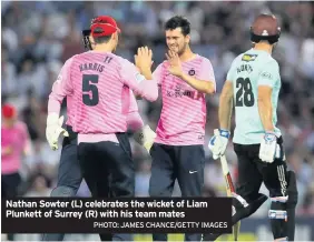  ?? PHOTO: JAMES CHANCE/GETTY IMAGES ?? Nathan Sowter (L) celebrates the wicket of Liam Plunkett of Surrey (R) with his team mates