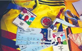  ?? LUIS FELIPE DE LA HOZ Y CORTESÍA ?? Las boletas y los tickets con los que Jorge y Diógenes disfrutará­n del Mundial.