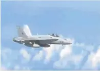  ??  ?? Caza español F-18 del Ala 12
El avión del Ejército del Aire se aproxima al avión donde se encuentra el ministro ruso.