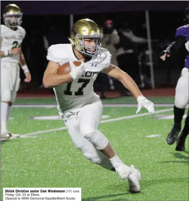  ?? (Special to NWA Democrat-Gazette/Brent Soule) ?? Shiloh Christian senior Cam Wiedemann (17) runs Friday, Oct. 23 at Elkins.