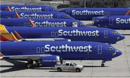  ??  ?? Southwest Airlines Boeing 737 Max aircraft parked in southern California after being grounded.Photograph: Mark Ralston/AFP via Getty Images