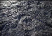  ?? MARY ALTAFFER—ASSOCIATED PRESS ?? In this Thursday, Aug. 29, 2019, photo a detail of one of the granite slabs and the steel from the original World Trade Center is seen at the 9/11 Memorial Glade at the National September 11Memorial & Museum in New York.