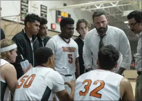  ?? WARNER BROS. PICTURES ?? Coach Jack Cunningham (Ben Affleck) addresses his players in a scene from “The Way Back.”