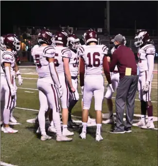  ?? PHOTO/MAGGIE NIXON ?? CMA Coach Andy Dorrel talks with his team during tourney play in 2021.