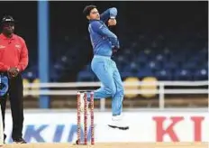  ?? AFP ?? Kuldeep Yadav bowls during the second ODI against West Indies at the Queen’s Park Oval in Port of Spain, Trinidad, on Sunday.