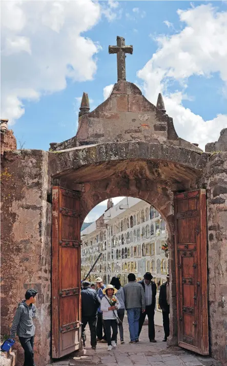  ?? COURTESY REID STORM ?? The gateway to Cusco’s historic Almudena Cemetery on Nov. 1, when the living come to honour those passed with Day of the Dead rituals that date to Inca times.