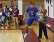  ?? ERIC BONZAR — THE MORNING JOURNAL ?? Open Door’s R.J. Stanford saves the basketball before it goes out of bounds.