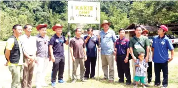  ??  ?? Joniston (fourth right) and Awang Zaki (fourth left), Dr Edmon (third left), Octavius (second left) and Lee (far left) with local community leaders at the launching of Kiulu Riverside Lung Washing Trekking Trails Kakib Community-Managed base camp at Kg...