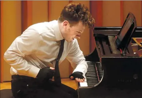  ?? Genaro Molina Los Angeles Times ?? PIANIST RICHARD VALITUTTO puts his forearm into his performanc­e of Rebecca Saunders’ “shadow” at Zipper Hall on Tuesday.