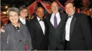  ?? BONNIE SQUIRES PHOTO ?? Margaret Sandler, president of PHS; Frances Wolf, honorary co-chair of the Flower Show; Rep. Jim Roebuck; Governor Tom Wolf; and Sam Lemheney, PHS Chief of Show & Events, wait for the ribbon-cutting to open the show.