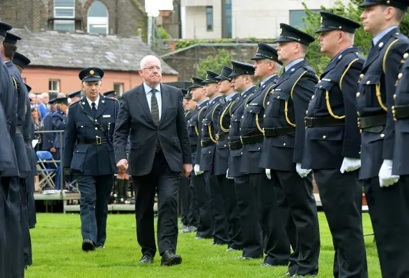  ?? Photo: Caroline Quinn ?? THIN BLUE LINE: Justice Minister Charlie Flanagan inspects the guard of honour at the annual commemorat­ion in Dublin Castle to honour members of An Garda Siochana killed in the line of duty.