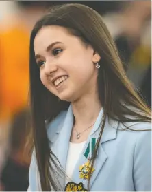  ?? ALEXANDER ZEMLIANICH­ENKO/THE ASSOCIATED PRESS FILES ?? Kamila Valieva was 15 when she represente­d the Russian Olympic Committee at the 2022 Olympics. Proposed rule changes would increase the minimum age to 17 for major internatio­nal figure skating competitio­ns.