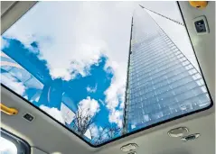  ??  ?? SEAT BELT ON, HEADS UP The taxi’s panoramic roof offers a better view of London’s landmarks