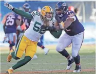  ?? JIM MATTHEWS / USA TODAY NETWORK-WISCONSIN ?? Clay Matthews tries to push past Chicago’s Charles Leno on Sunday. Matthews said his pass rushing felt better last week.