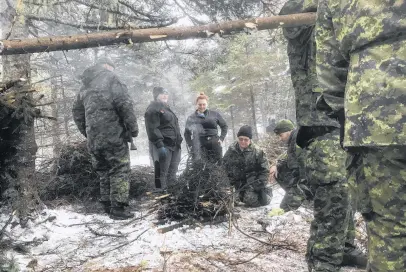  ??  ?? Army cadets from the Truro and New Glasgow detachment­s conducted a weekend-long winter survival exercise in the countrysid­e near Debert. Cadets learned how to erect tents and makeshift shelters using branches and bushes, and to snowshoe across rough terrain.