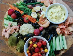  ??  ?? A Le Grand Aioli platter includes the aioli spread, shellfish and vegetables.