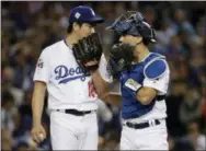  ?? MATT SOLCUM — THE ASSOCIATED PRESS ?? In this file photo, Los Angeles Dodgers starting pitcher Kenta Maeda talks to catcher Austin Barnes during Game 6 of the World Series against the Houston Astros last October. Major League Baseball is imposing stricter limits on mound visits in an...