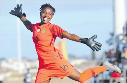  ?? Picture: Backpagepi­x ?? HAPPY TIMES. Banyana goalkeeper Andile Dlamini celebrates after their 3-1 win over Zimbabwe in the semifinals of the Cosafa Women Championsh­ip in Port Elizabeth on Thursday.