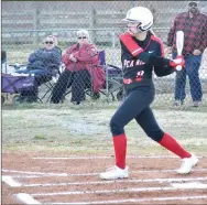  ?? ?? Freshman Lady Blackhawk Ashlynn Short, No. 9, bats in the game against the Lady Elks.