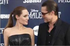  ?? MATT SAYLES, THE ASSOCIATED PRESS ?? Angelina Jolie and Brad Pitt were Hollywood’s perfect couple.