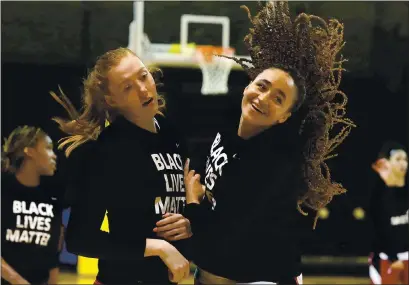  ?? SHMUEL THALER – SANTA CRUZ SENTINEL ?? Haley Jones keeps it light as she interacts with fellow Stanford sophomore Ashten Prechtel during pregame warmups at Kaiser Permanente Arena in downtown Santa Cruz on Friday.