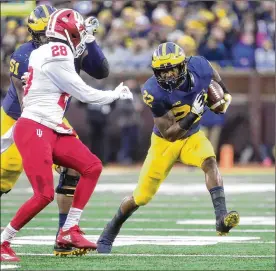  ?? KIRTHMON F. DOZIER / DETROIT FREE PRESS ?? Michigan’s Karan Higdon ran for 101 yards and a touchdown as the Wolverines fought off a feisty Indiana team Saturday in a 31-20 victory.