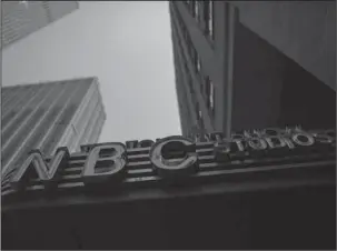  ?? The Associated Press ?? NO RISK: The NBC logo at their television studios at Rockefelle­r Center in New York. On Wednesday, President Donald Trump threatened NBC’s broadcast licenses because he’s not happy with how its news division has covered him. But experts say it’s not...