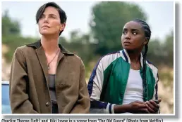  ??  ?? Charlize Theron (left) and Kiki Layne in a scene from ‘The Old Guard’ (Photo from Netflix)