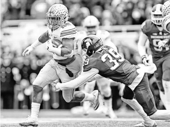  ?? MIKE CARTER, USA TODAY SPORTS ?? Mike Weber rushed for 1,072 yards and nine touchdowns in his first year as Ohio State’s starting running back. But Weber had bigger goals. “I expected 2,000 yards and 20 touchdowns. ... I’m just going to work my hardest and try to get it next year.”