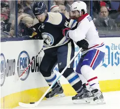  ?? PAUL VERNON / THE ASSOCIATED PRESS ?? Former Columbus Blue Jackets defenceman James Wisniewski, left, quickly ran out of room in the NHL.