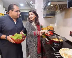  ??  ?? Bilal (left) and Dr Sobia like to prepare their family’s favourite dishes.
