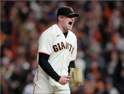  ?? RAY CHAVEZ — BAY AREA NEWS GROUP ?? Giants starting pitcher Logan Webb reacts after the Dodgers’ Cody Bellinger struck out for the last out of the seventh inning of Game 5of the National League Divisional Series at Oracle Park in San Francisco on Thursday.