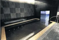  ??  ?? ABOVE
An indoor hot spring bath at Hoshinoya Tokyo.