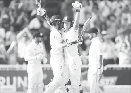  ?? ?? Victory! England skipper Ben Stokes and Ben Foakes celebrate their team’s astonishin­g last day triumph. (Photo Twitter)