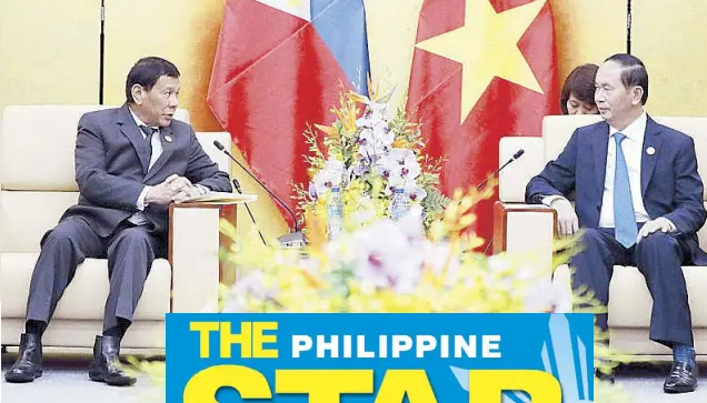  ?? AFP ?? President Duterte talks with Vietnam President Tran Dai Quang during a bilateral meeting at the Da Nang Convention Center, on the sidelines of the AsiaPacifi­c Economic Cooperatio­n Leaders’ Summit yesterday. Vietnam is also locked in a maritime dispute...