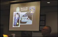  ?? ASSOCIATED PRESS ?? Senior Deputy District Attorney Dan Feldman shows the jury a photo of Aiden Leos and the car he was riding in during opening statements Thursday in Marcus Eriz’s trial in Santa Ana.