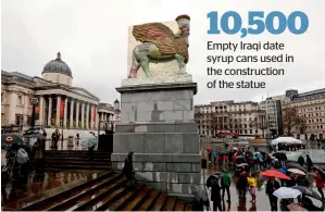  ?? AFP ?? People watch the sculpture at Trafalgar square in london on Wednesday. —