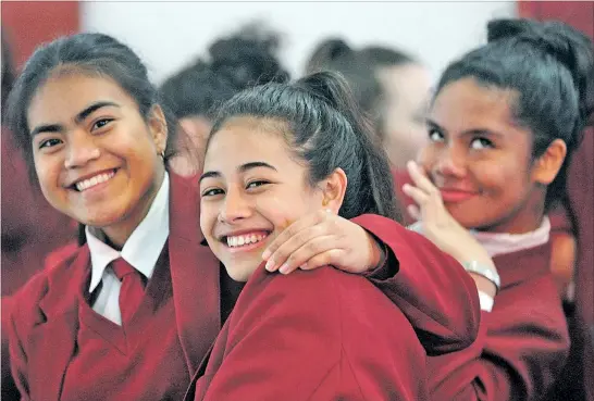  ?? PHOTOS/PAUL TAYLOR ?? THE WAIT: Pupils of Sacred Heart College, Napier, bide their time between speeches: Vivian Toange (left), Stephanie Ahlin and Alisi Katou.